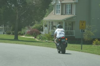 Chris Riding in Shorts