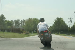 Chris riding in shorts