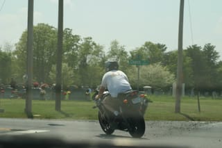 Chris Riding in shorts