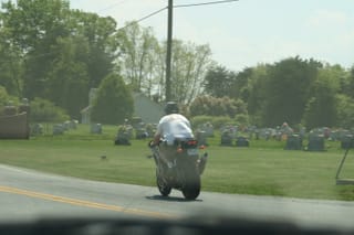 Chris Riding in Shorts