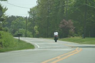Chris riding in shorts