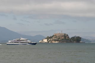 Alcatraz Island with passing Ferry