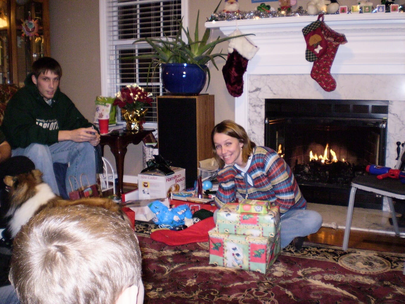 Mary opening Christmas Presents