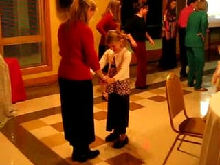 Mary and Lauren dancing to the "cha cha?"