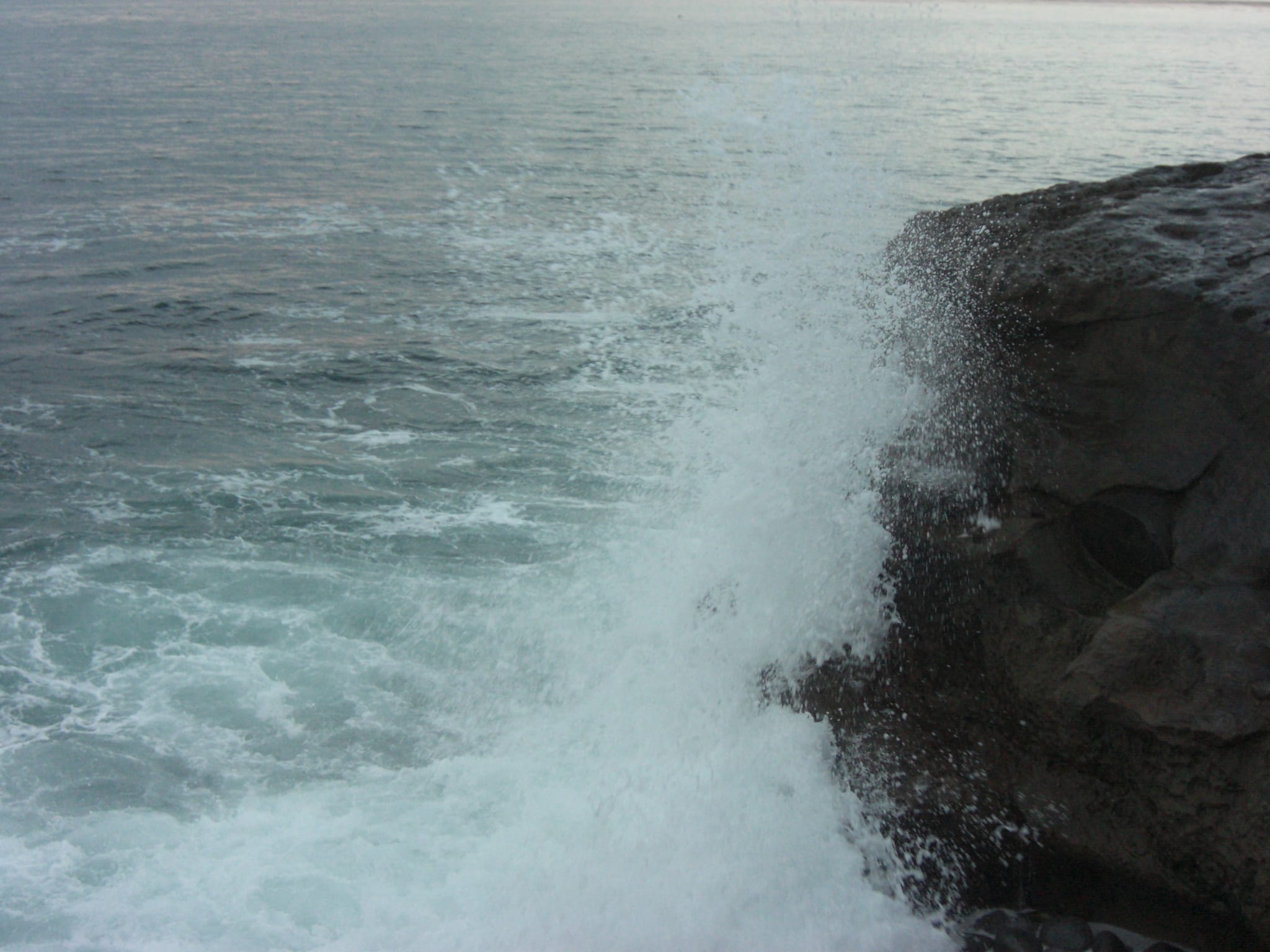 Waves crashing on the rocks in San Diego, California