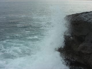 Waves crashing on the rocks in San Diego, California