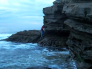 Chris Climbing Rocks on the San Diego Shore