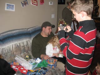 Marty, Caroline, and Hayden figuring out gifts