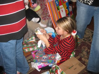 Lauren opening gifts