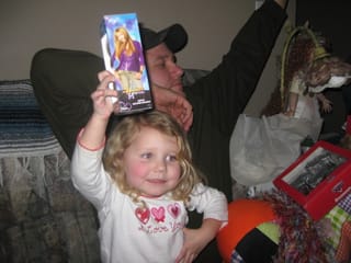 Caroline with Hanna Montana gift