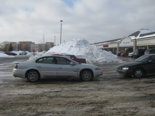 Piles twice as high as the cars
