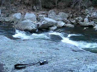 Walking down a big rock