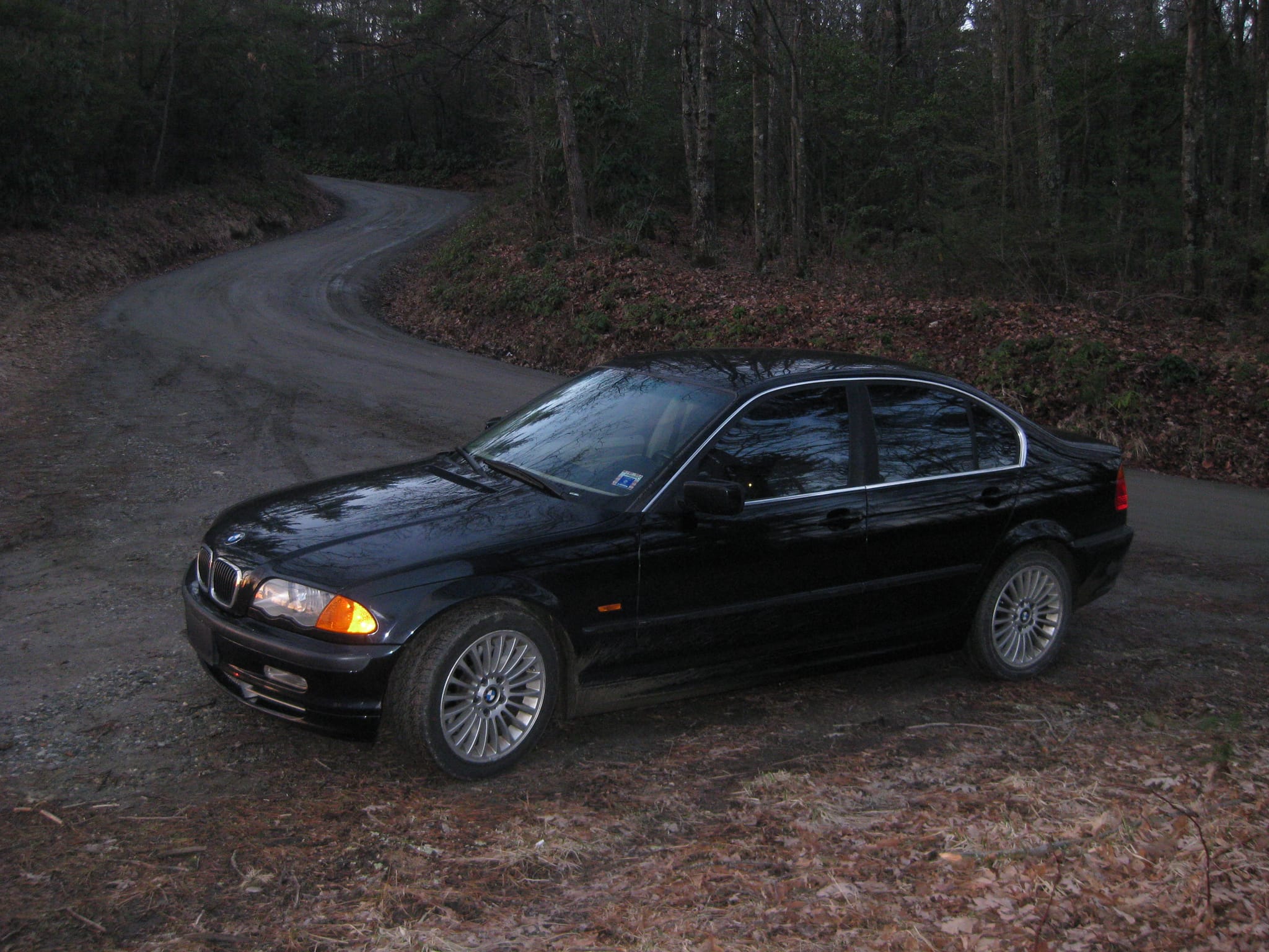 Bimmer on the dirt & gravel approach road