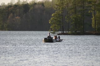 Lake Townsend Marina - towing a rowboat back from the dam