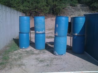 I've played this level before, and the barrels explode when you shoot them...