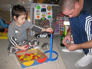 William and Jimmy playing connect four