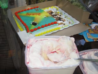 Half a cake left and lots of ice cream remaining
