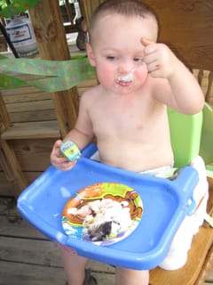 Robert eating the cake and ice cream