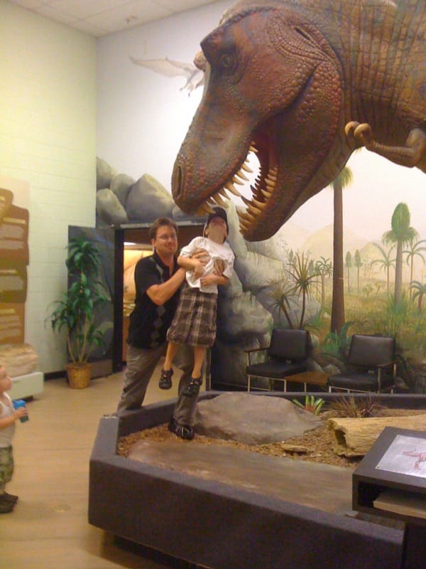 Willam is fed to the T-Rex by his Uncle Chris