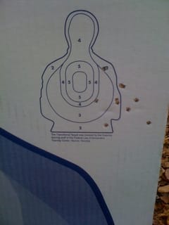 50 yards - scoped .22