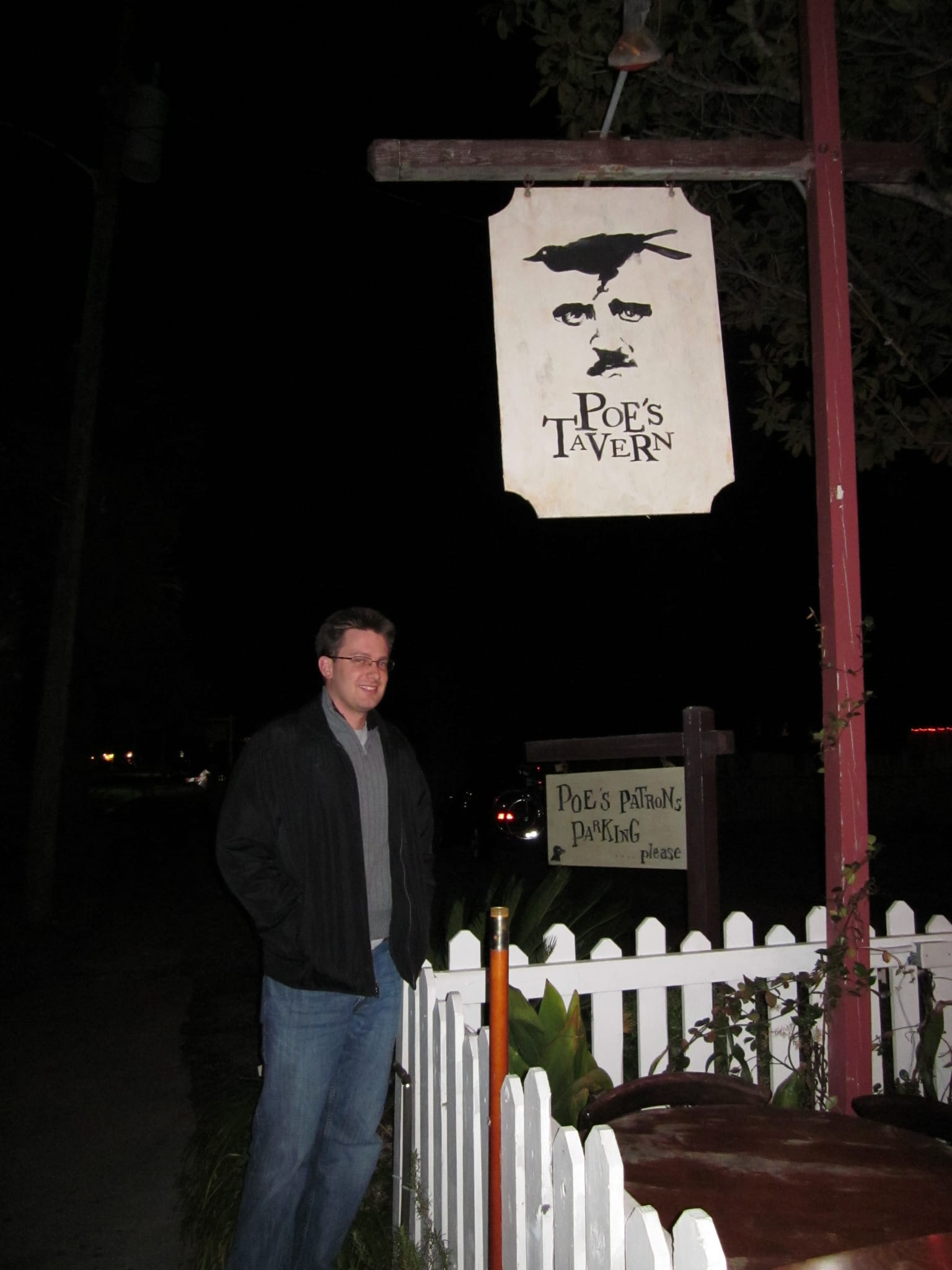 Chris in front of Poe's Tavern on Sullivan's Island