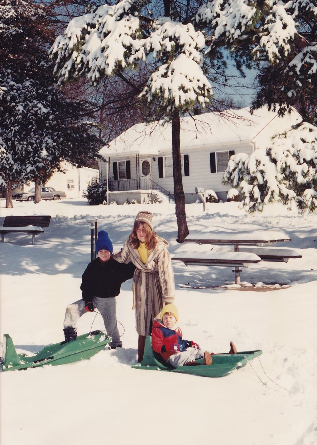 Chris, Mom & Mr Yellow Boggin' with their Amazing Green Sleds