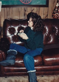 Stan's wife Sara (I think) playing video games