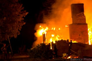 Firefighter and buring building