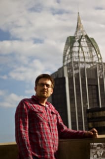 Chris on top of the Battle House Hotel, Mobile, AL