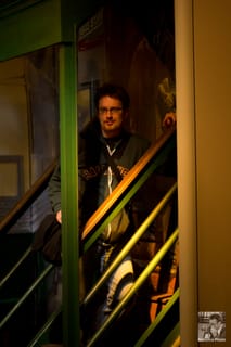 Chris aloof stare on the stairs