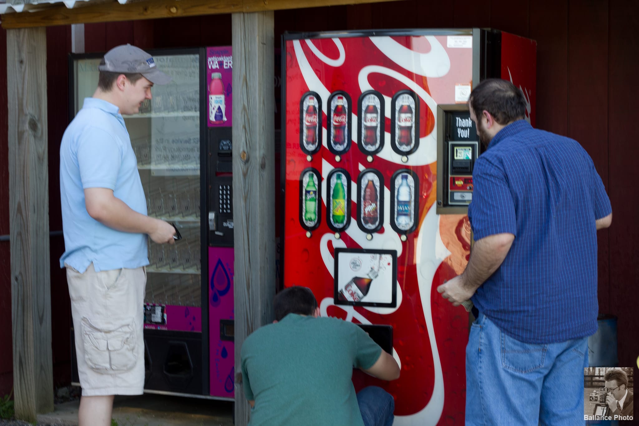 How many Race Car Drivers does it take to get a coke out of a vending machine?