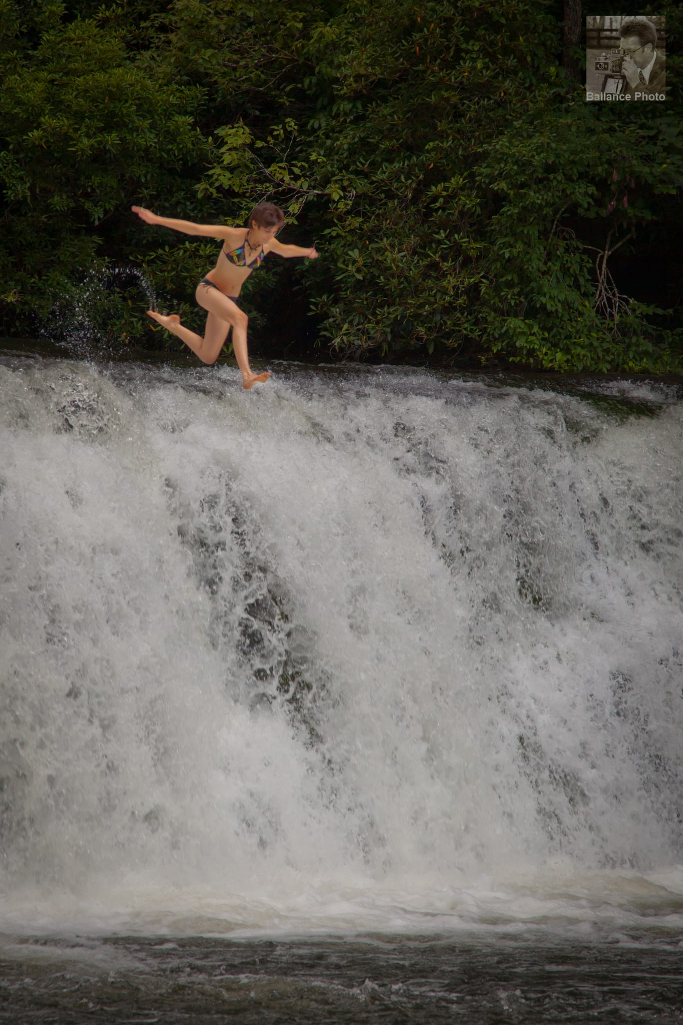 Just a girl jumping off of a waterfall.  Nothing to see here.