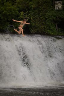 Just a girl jumping off of a waterfall.  Nothing to see here.