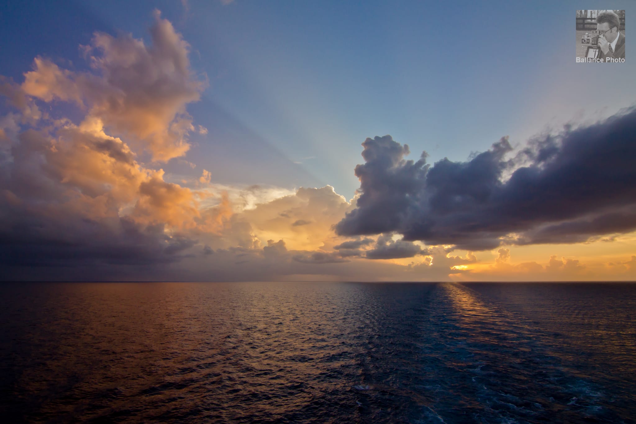 Many hues of a sunset - Carnival Fascination - Aft view en route to Half Moon Cay, Bahamas